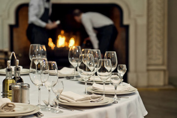 Glass dishes on a table on a white tablecloth