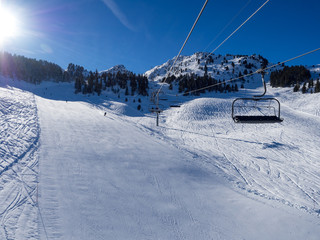 Landscape of ski slopes and mountains in Family Park of Courchevel, France. January, 2018