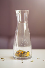 Carafe with herbal tea leaves