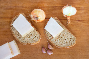 rural simple and nutritious food: bread, lard, onions and garlic