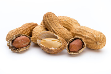 Dried peanuts on the white background.