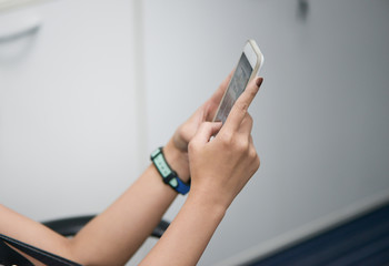 Close up of woman hand is using the smart phone
