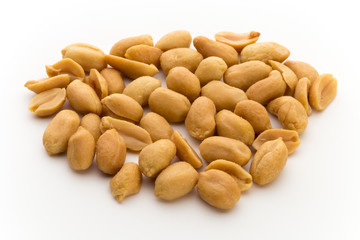 Peeled peanuts on the isolated background.
