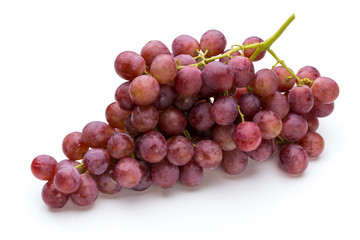 Ripe red grape isolated on white.