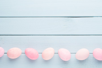 Pastel Easter eggs background. Spring greating card.
