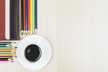 Desktop with coffee and supplies