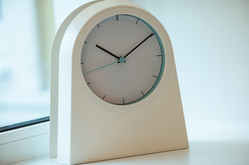 Fototapeta na wymiar A white modern clock