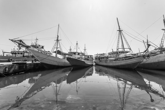 Traditional boats in Paotere harbor, Makassar, Indonesia. Indonesian sailor have been using this kind of boat called Pinisi to sail as far as Africa since 14 century.