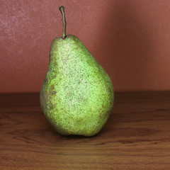 Pear on a wooden background. Fruit.