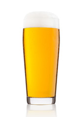 Cold glass of lager ale beer with foam and dew