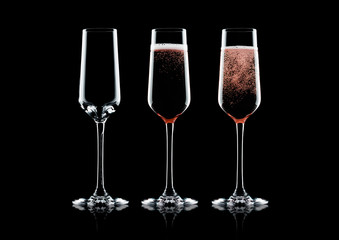 Rose pink champagne glasses with bubbles