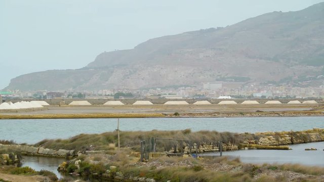 16804_The_mountain_on_the_side_of_the_saltmine_area_in_Trapani_Sicily_Italy.mov