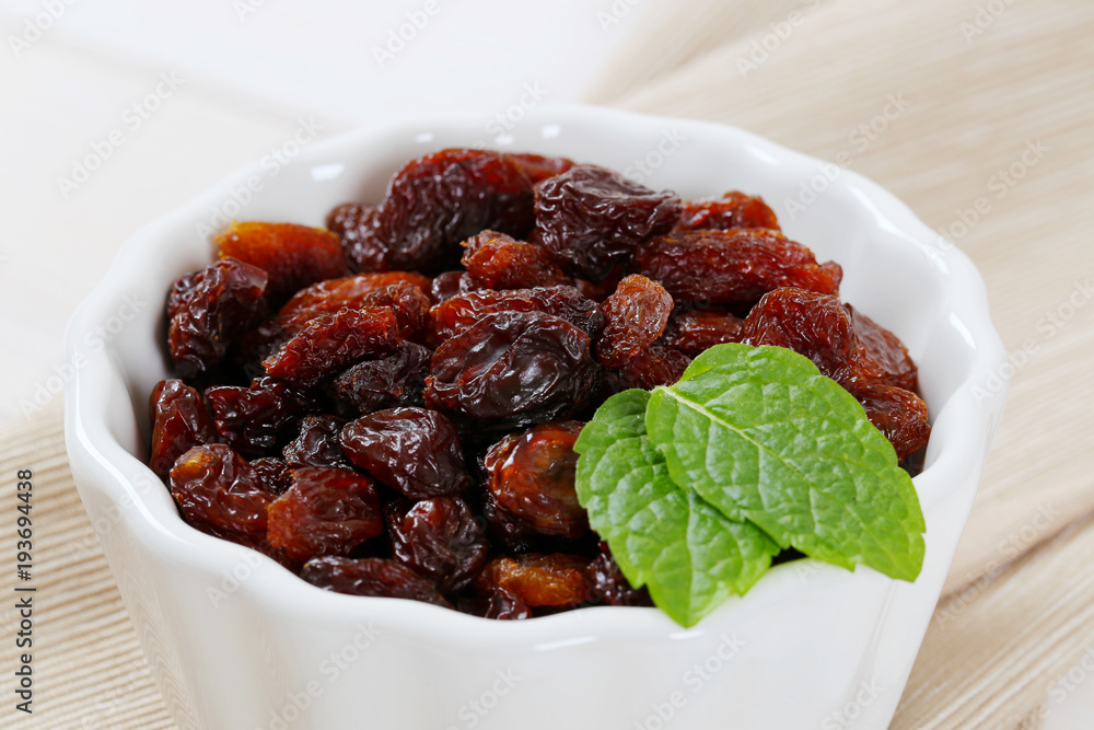 Poster bowl of sweet raisins