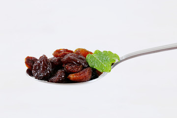 spoon of sweet raisins