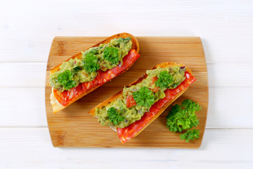 baguettes with salami and guacamole