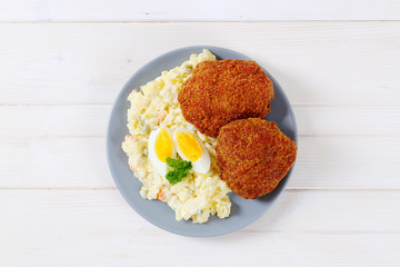 fried burgers with potato salad