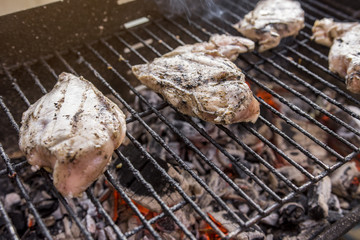 Hot Outdoor BBQ Grill With Tasty Chicken Breast Meat