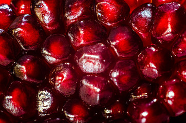 claret grains of pomegranate close-up