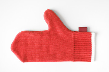 Red mitten on white background