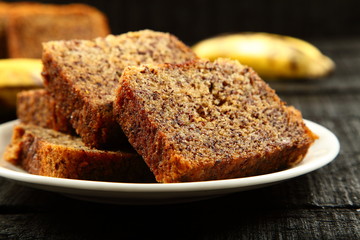 delicious banana cake on a rustic wooden table.