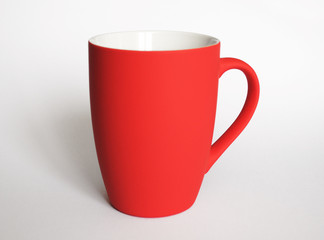 Red mug on white background