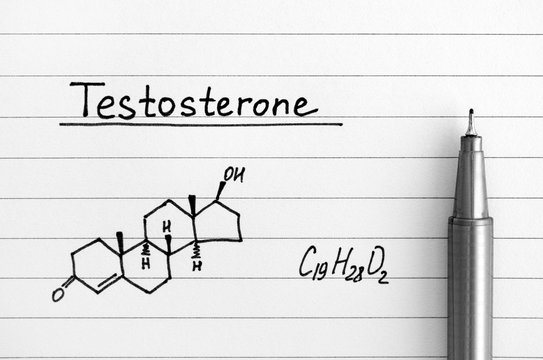 Chemical formula of Testosterone with black pen on lined paper.
