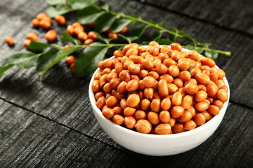 Tasty slated and spices peanuts in bowl.