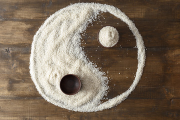 Spilled rice in yin yang form