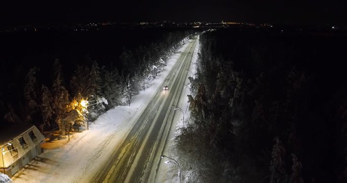 aerial shot road at night in winter