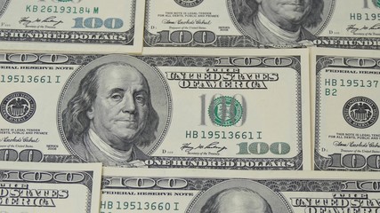 Hundred dollar bills. Macro photography of banknotes. The motion camera slider. Portrait of Benjamin Franklin - 2