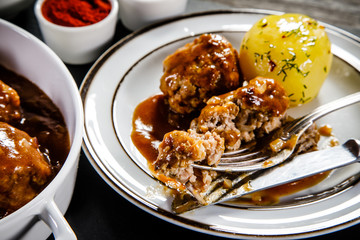 Roasted meatballs, potatoes and vegetables