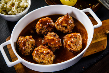 Roasted meatballs, potatoes and vegetables