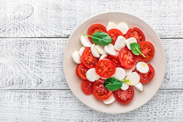 plate of a simple traditional Italian salad caprese
