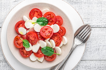 plate of a simple traditional Italian salad caprese