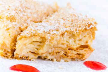 Homemade cake Napoleon on white plate