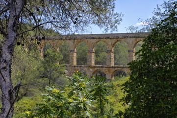 Fototapeta na wymiar Roman Aqueduct Pont del Diable in Tarragona, Catalonia, Spain