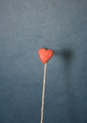 Heart shaped balloon. Flat lay. Selective focus. Minimal concept. 