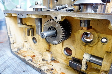 Gear gear from the assembly mechanism at the production plant in disassembled form close-up.