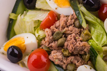 Boiled meat with capers, cherry tomatoes, fresh cucumbers and egg
