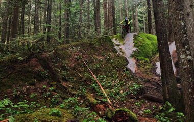 Trail biking Squamish rock face enduro