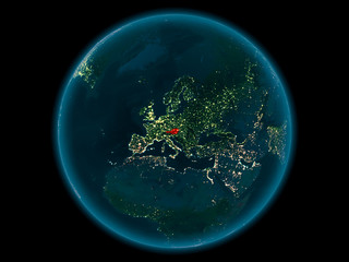 Austria on planet Earth in space at night