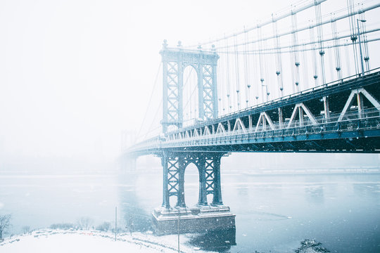 Manhattan Bridge over East River during winter
