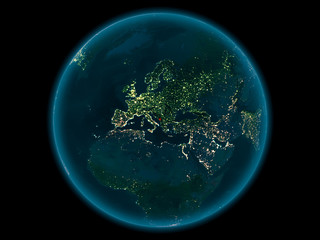 Montenegro on planet Earth in space at night