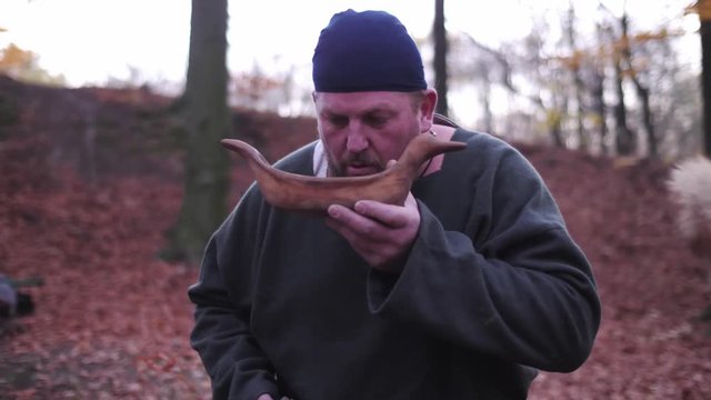 Vikings have some fun. Viking play with egg, bringing eggs on a sword