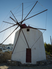 Fototapeta na wymiar Α close-up of a windmill in the country of Astypalaia