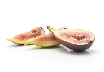 Sliced figs two slices one section half isolated on white background ripe fresh rose flesh.