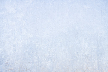 Winter frosty patterns on the frozen ice window