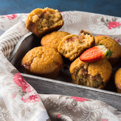 Peanut butter muffins with strawberry jam. Home made treat.