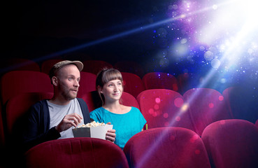 Naklejka premium Romantic couple sitting at spectacle