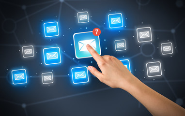 Hand touching mail icon